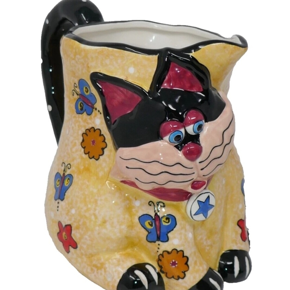 Colorful Cat Pitcher with Floral Design. *